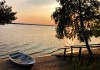 Фото Сдаю уютный коттедж у озера с камином и баней - Селигер